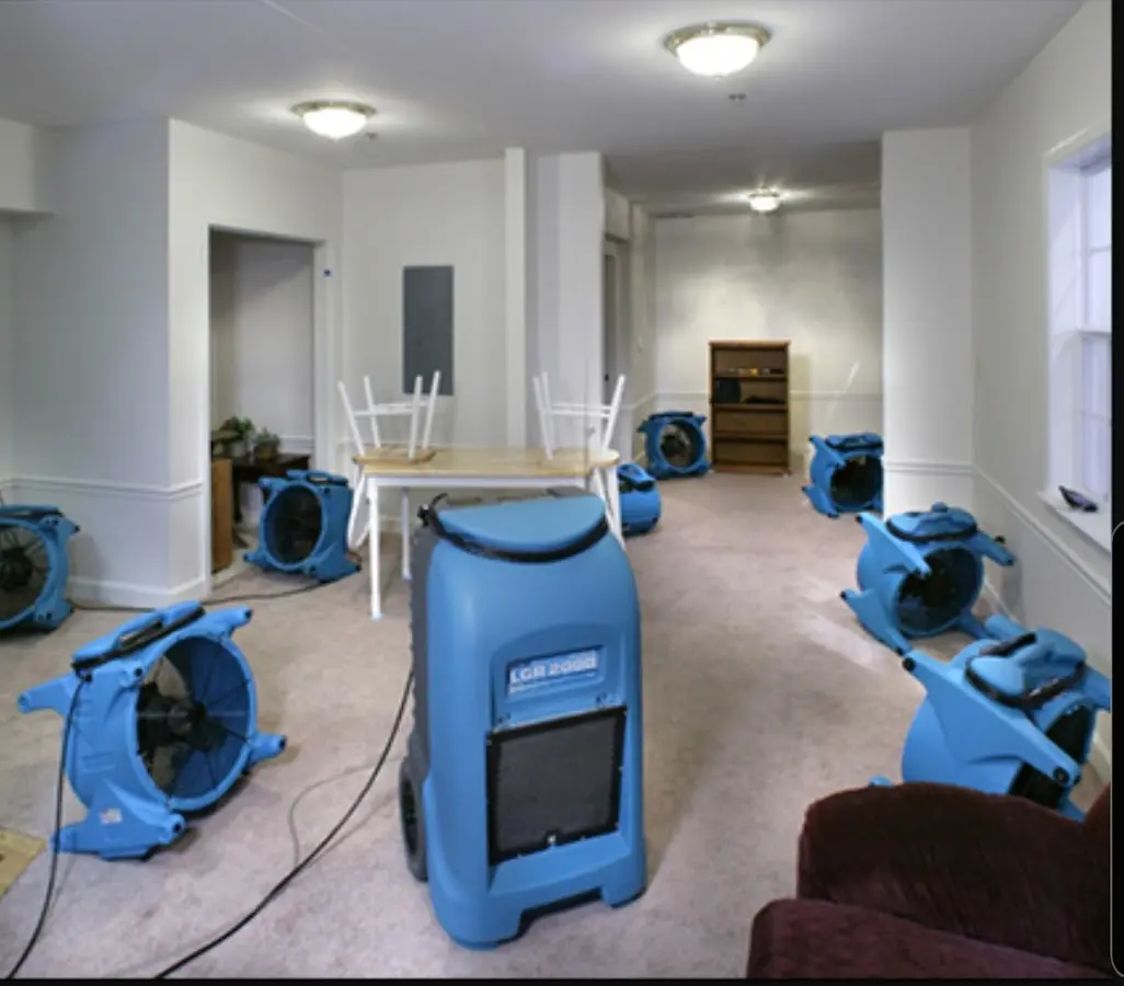 Air movers and dehumidifier setup for Water Damage Restoration in Lockport